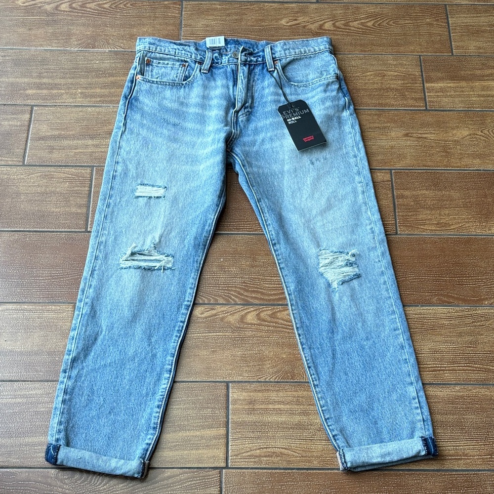 Levi's Men's Straight Jeans in Faded Blue with Ripped Accents